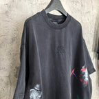 Balenciaga short-sleeve T-shirt, dark gray-black with chest logo and right-side paint print