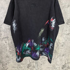 Balenciaga short-sleeve T-shirt front, black with large colorful abstract paint print on hem