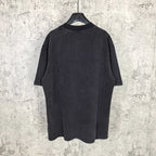 Black short-sleeve T-shirt, back view, crew neck and relaxed fit.