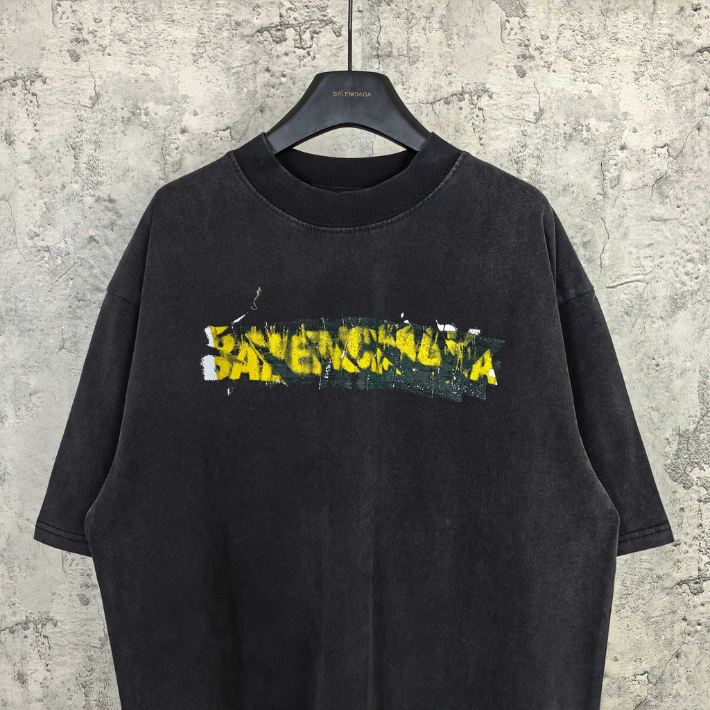 Black short-sleeve T-shirt with Balenciaga logo graphic, crew neck.