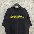 Black short-sleeve T-shirt with Balenciaga logo graphic, crew neck.
