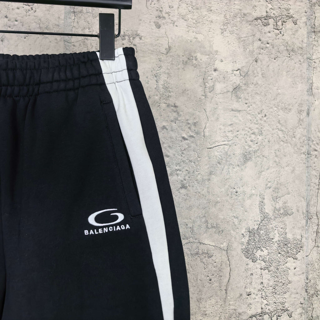 Black Balenciaga shorts with elastic waistband and white side stripe, Balenciaga logo