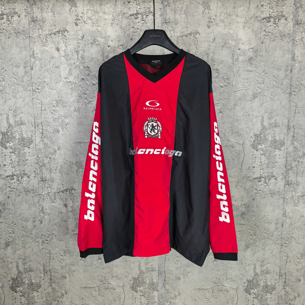 Long-sleeve Balenciaga jersey with black sleeves and red front panel, crest and logos.