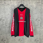 Long-sleeve Balenciaga jersey with black sleeves and red front panel, crest and logos.