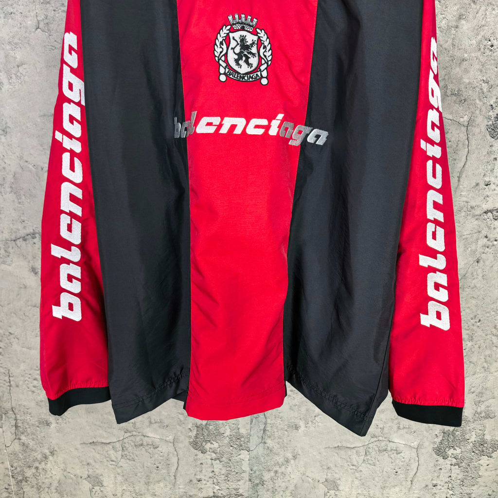 Balenciaga long pants in red and black with crest and white logo print