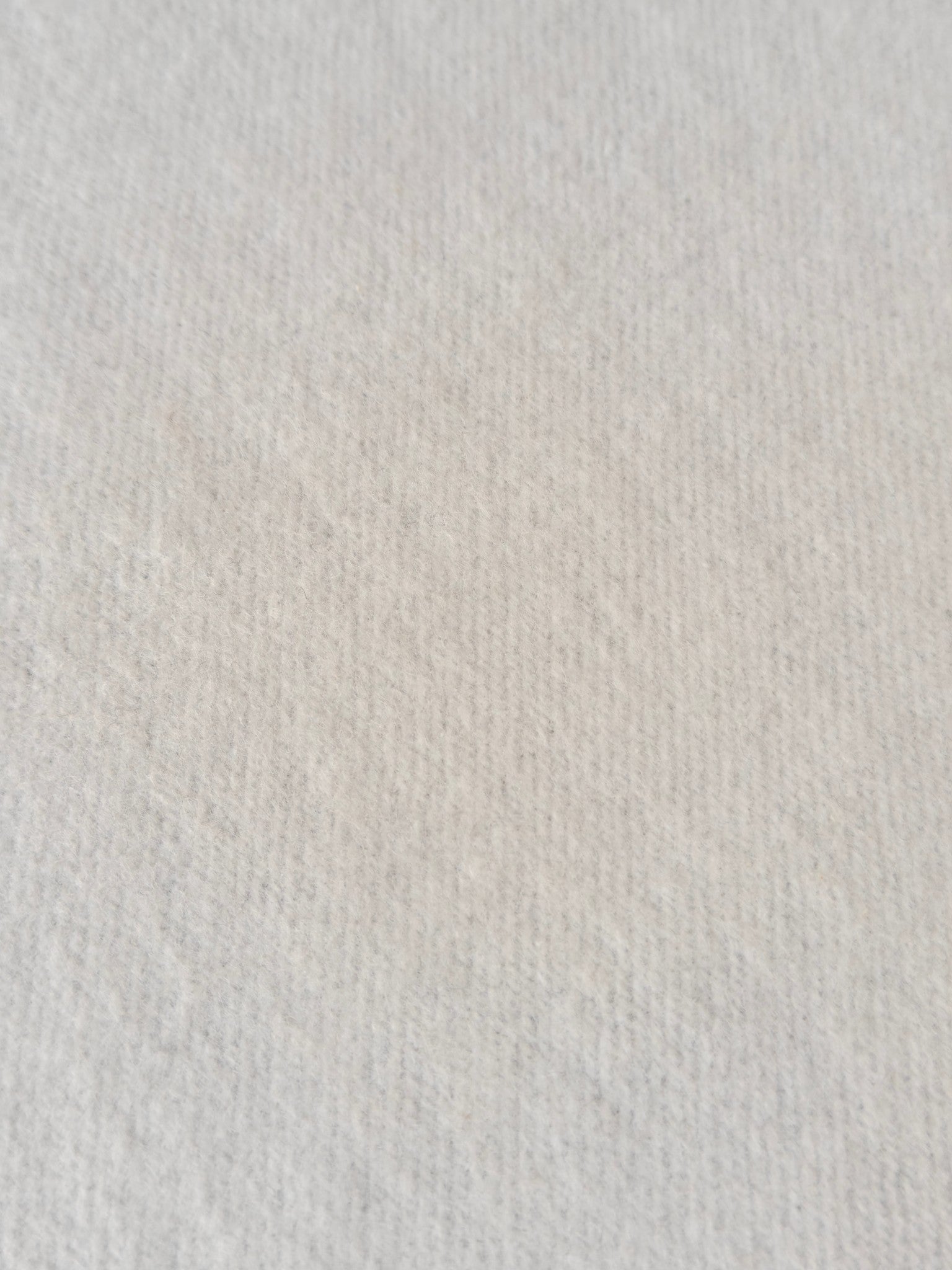 Light gray knit hoodie fabric texture, no visible hardware