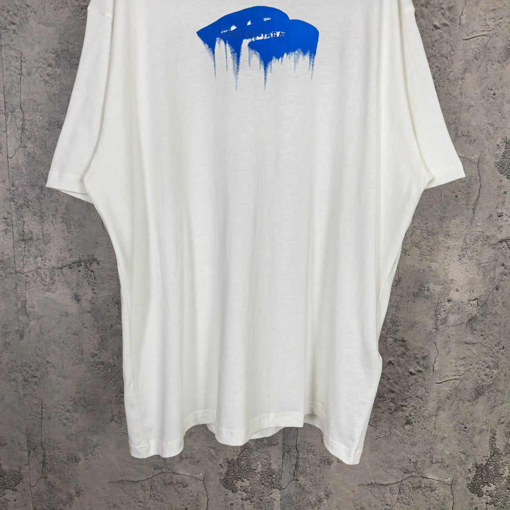 White short-sleeve T-shirt with centered blue drip graphic