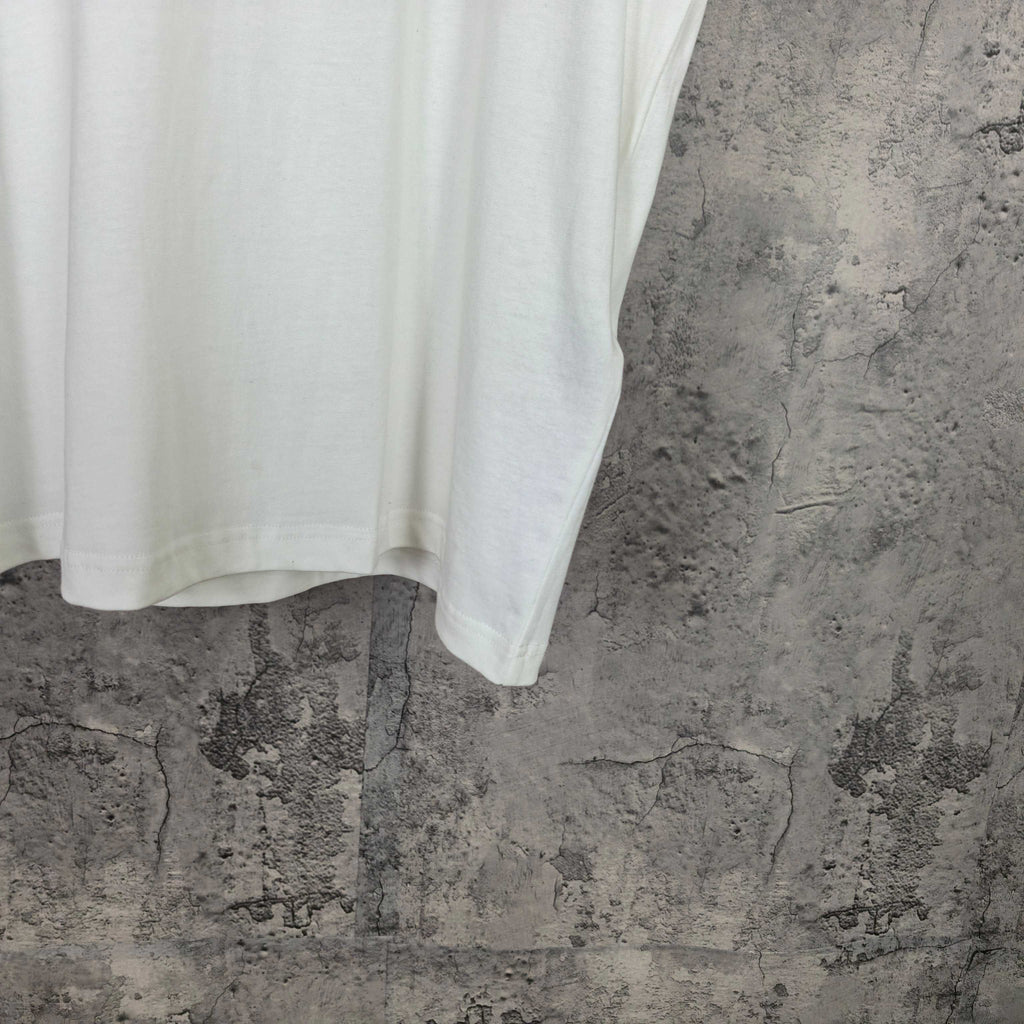 Balenciaga white shorts, side hem and seam detail
