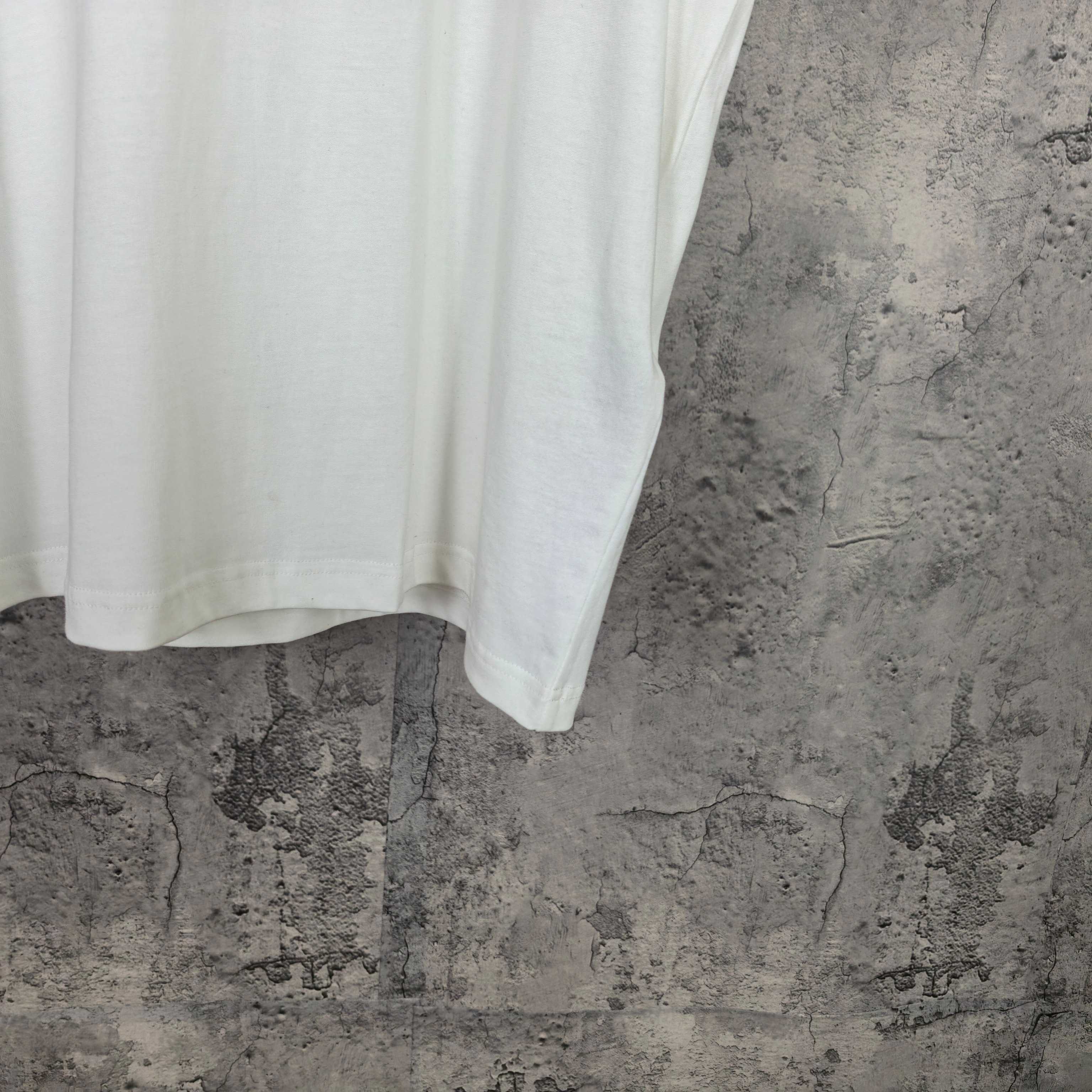 Balenciaga white shorts, side hem and seam detail