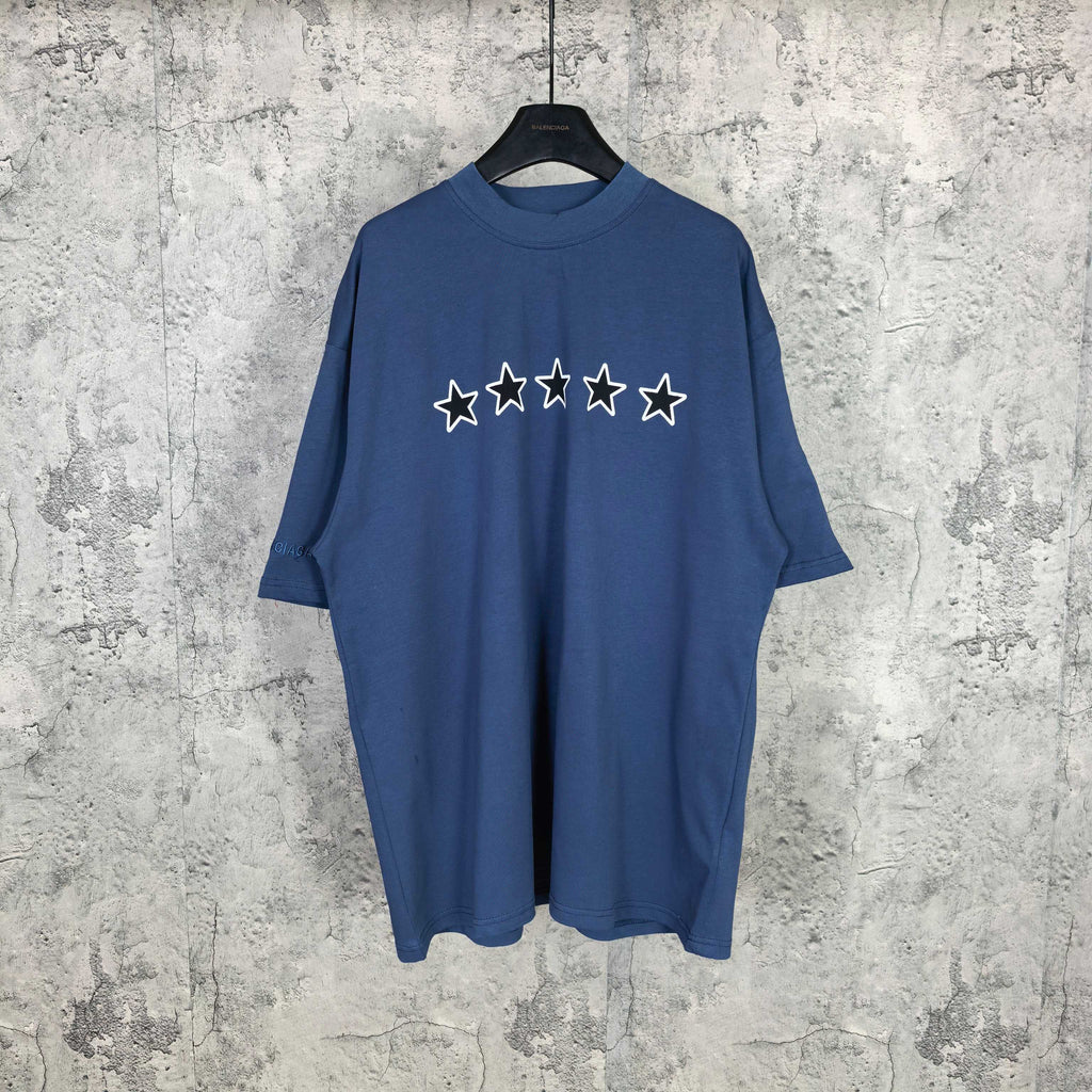 Balenciaga short-sleeve T-shirt, blue with white star graphic on chest.