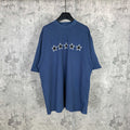 Balenciaga short-sleeve T-shirt, blue with white star graphic on chest.