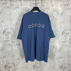 Balenciaga short-sleeve T-shirt, blue with white star graphic on chest.