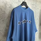 Balenciaga short-sleeve T-shirt, blue; chest features white outlined star cluster.