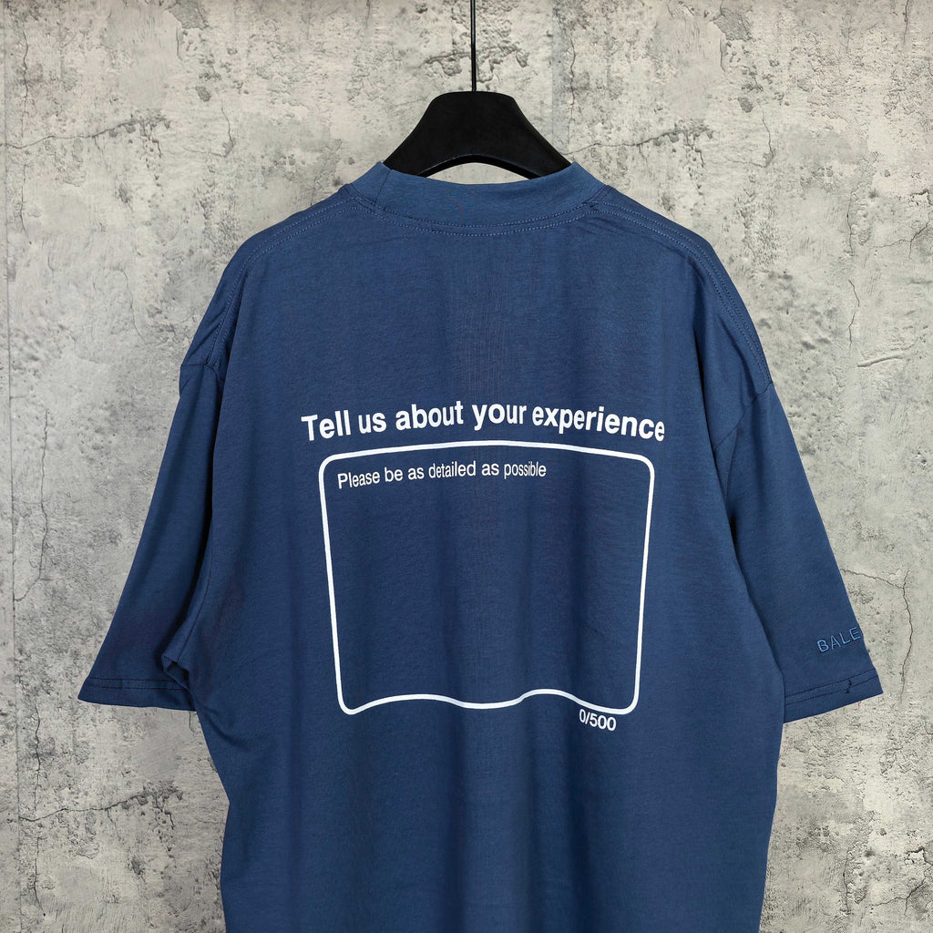 Balenciaga short-sleeve T-shirt, blue; back has 'Tell us about your experience' outline box.