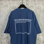 Balenciaga short-sleeve T-shirt, blue; back has 'Tell us about your experience' outline box.