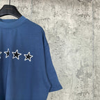 Balenciaga blue short-sleeve t-shirt with white star graphic on chest