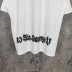 Balenciaga white graphic T-shirt back view with black stylized text at hem
