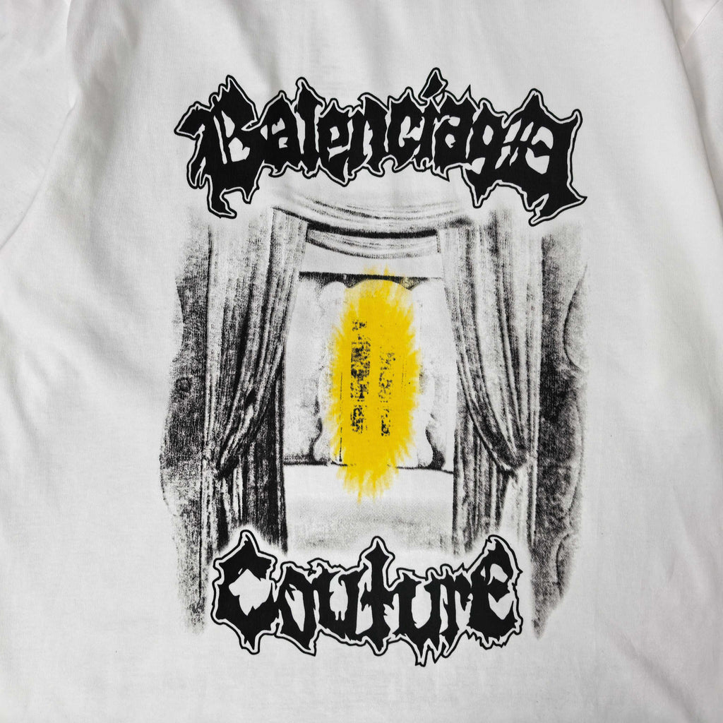 Balenciaga white T-shirt close-up of yellow center panel with black lettering