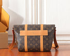 Monogram crossbody bag with wide tan center panel and top handle