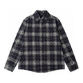 Long-sleeve button-up shirt in dark plaid with pointed collar and button front