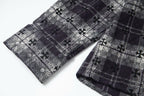 Long-sleeve button-up shirt with patterned cuffs and dark floral-plaid fabric