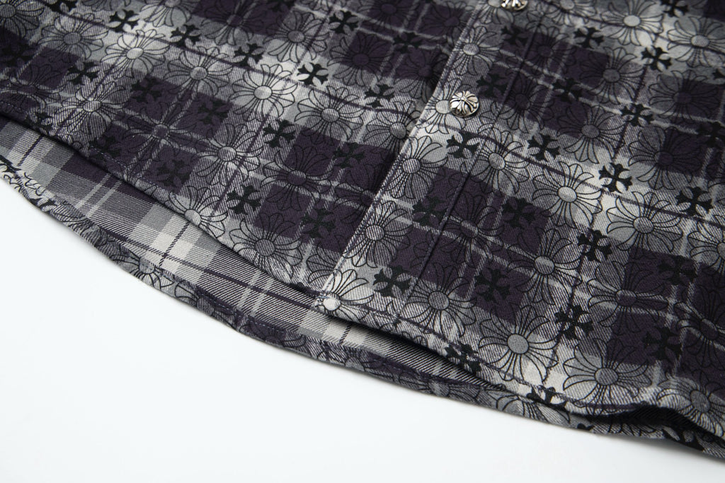 Long-sleeve shirt hem view with dark floral and plaid pattern panel