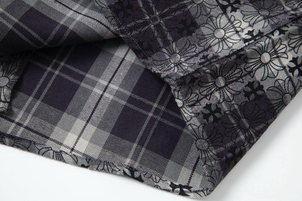 Long-sleeve shirt corner close-up showing plaid panel and floral print