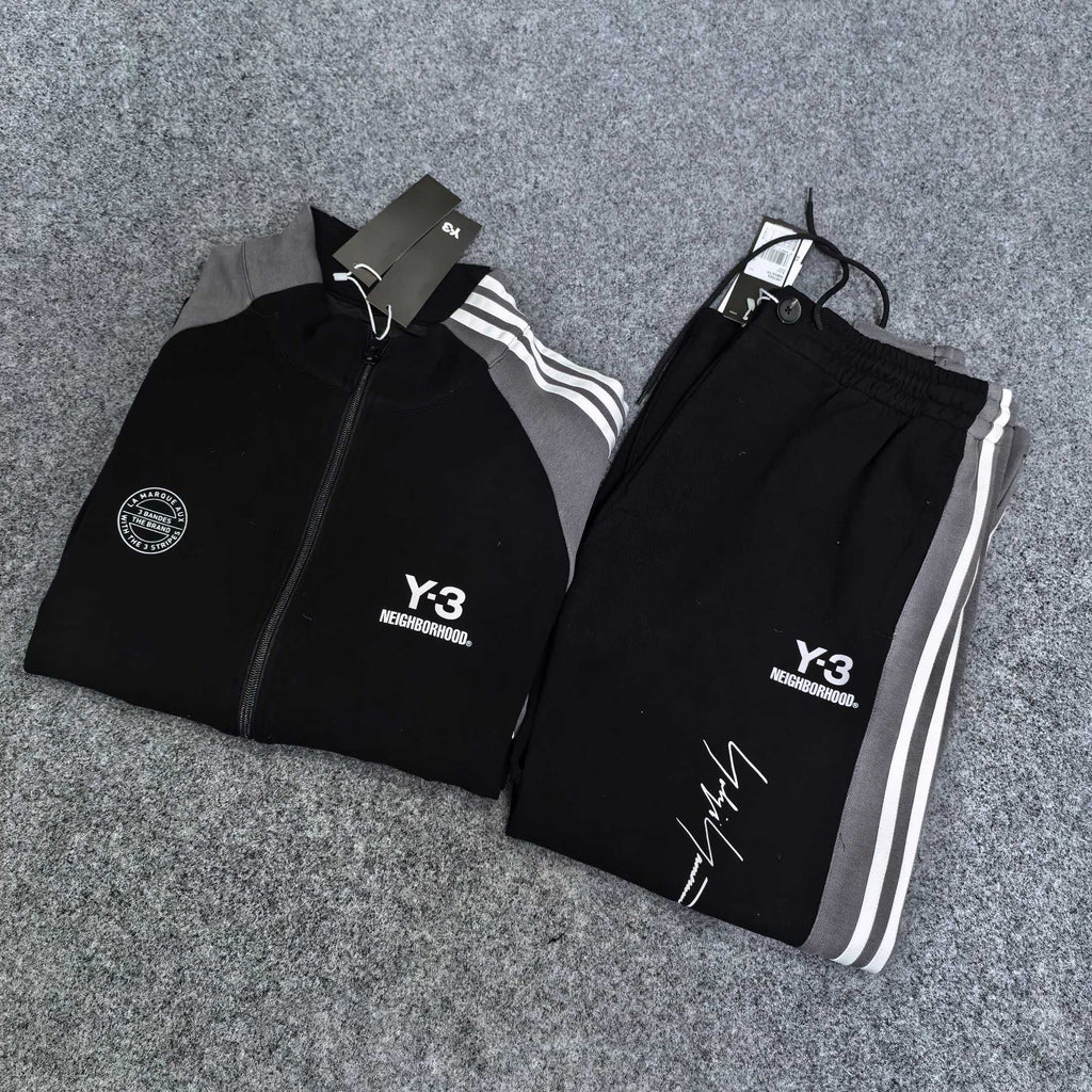 Black track jacket and track pants set with white stripes and Y-3 logos
