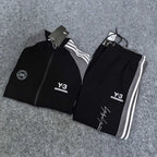 Black track jacket and track pants set with white stripes and Y-3 logos