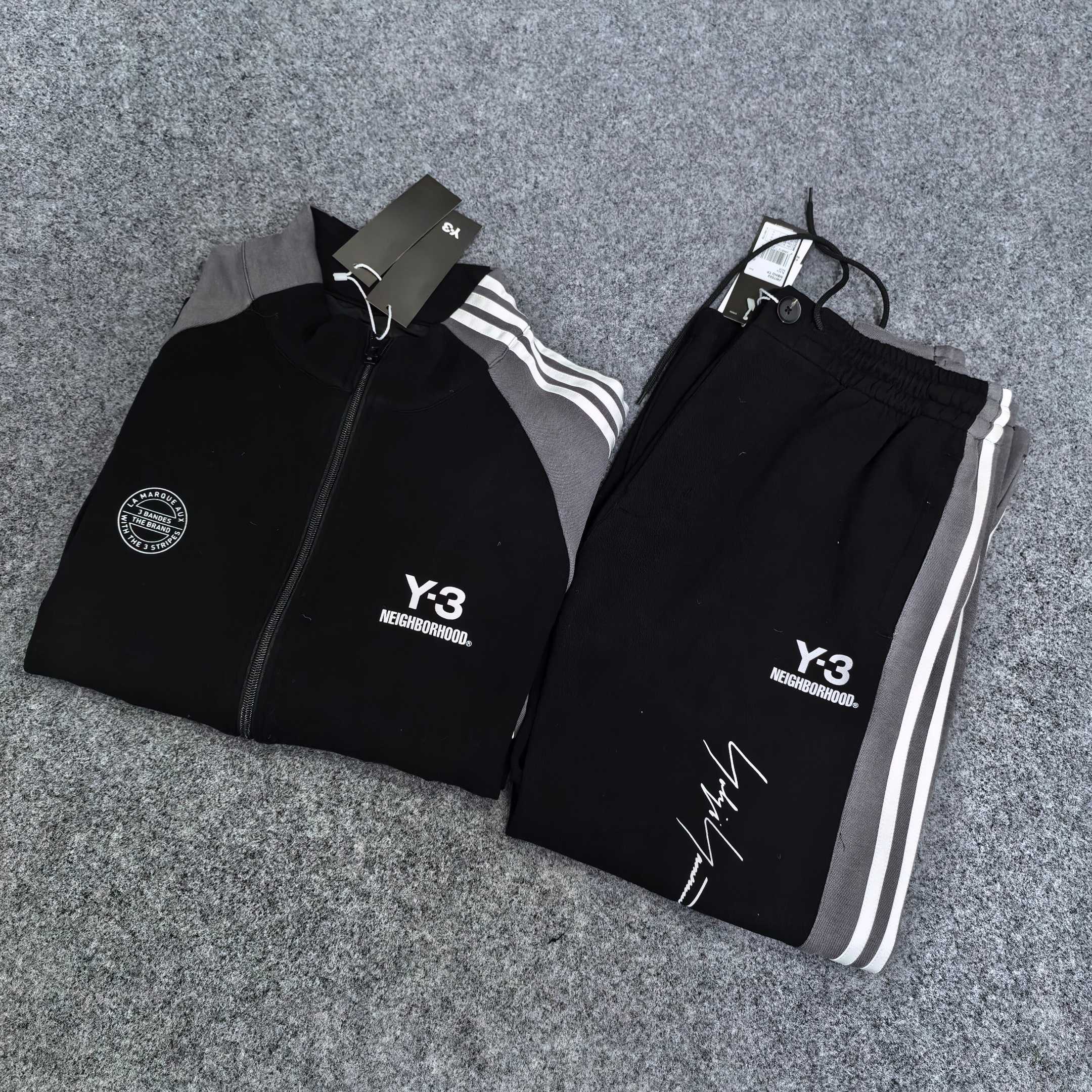 Black track jacket and track pants set with white stripes and Y-3 logos