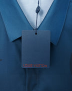Neckline tag on bright blue short-sleeve shirt with button placket