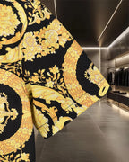 Versace short-sleeve shirt in black with gold floral and bird motif on the side