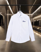 White long-sleeve button-up shirt with Dior chest logo