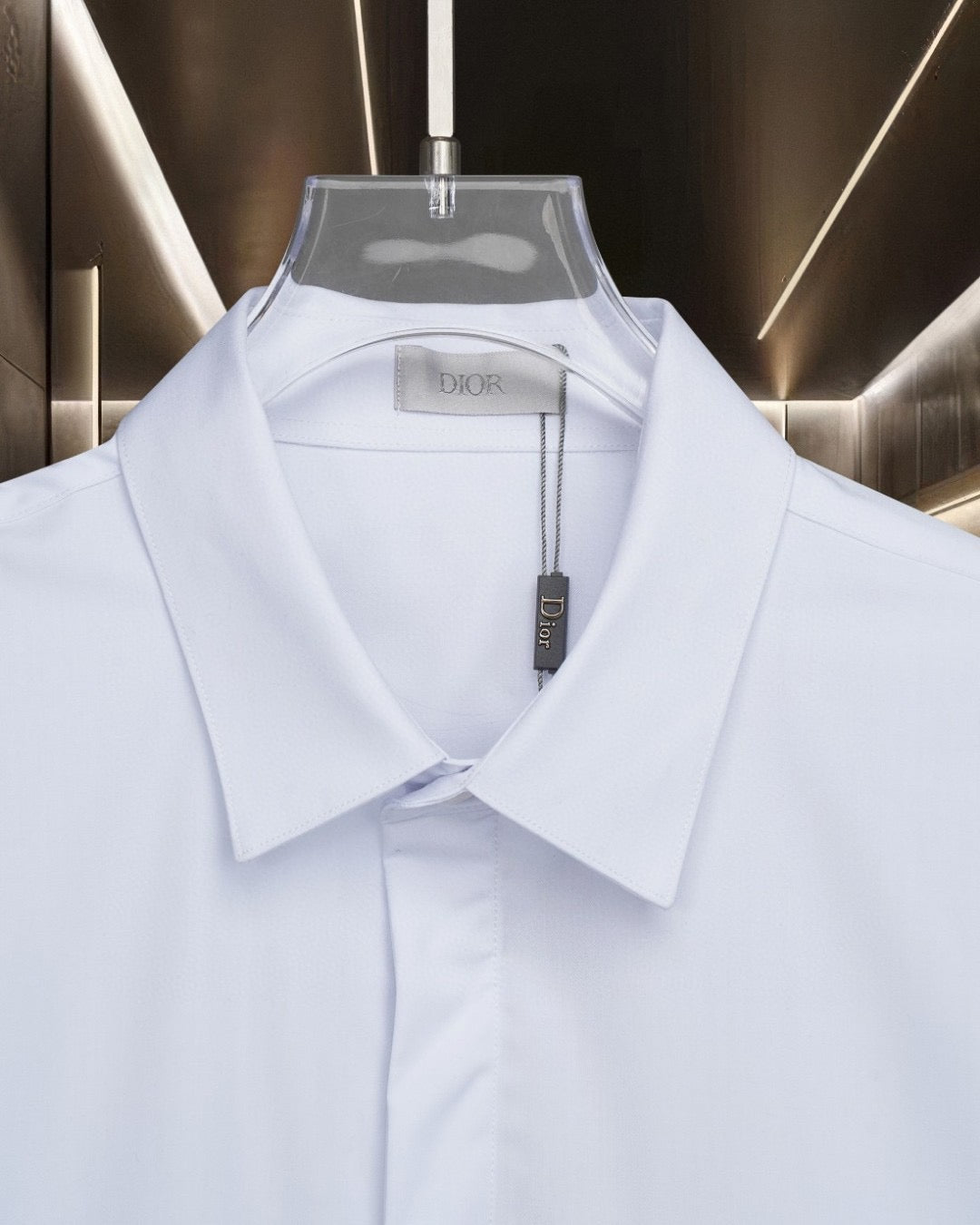 White button-up shirt collar with inner brand label