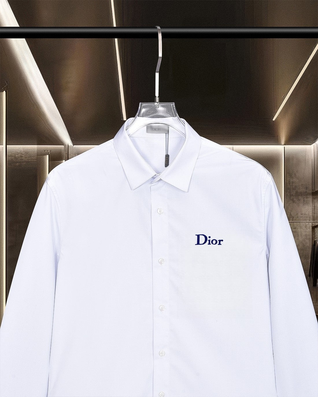 White button-up shirt front with Dior chest logo and pointed collar