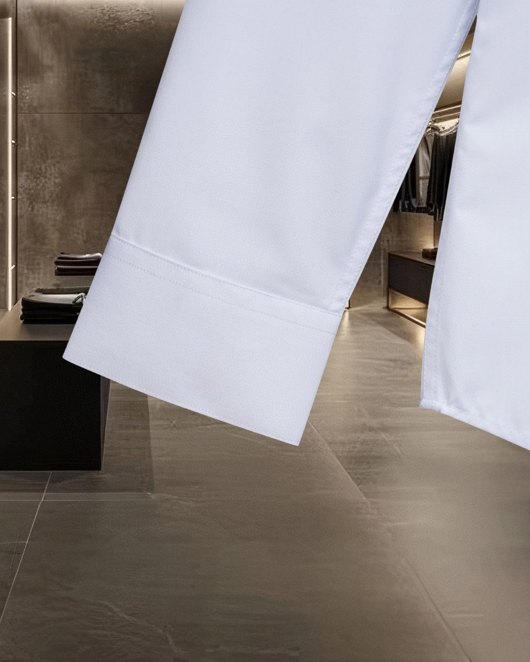 White shirt hem with side vent and stitched cuff detail