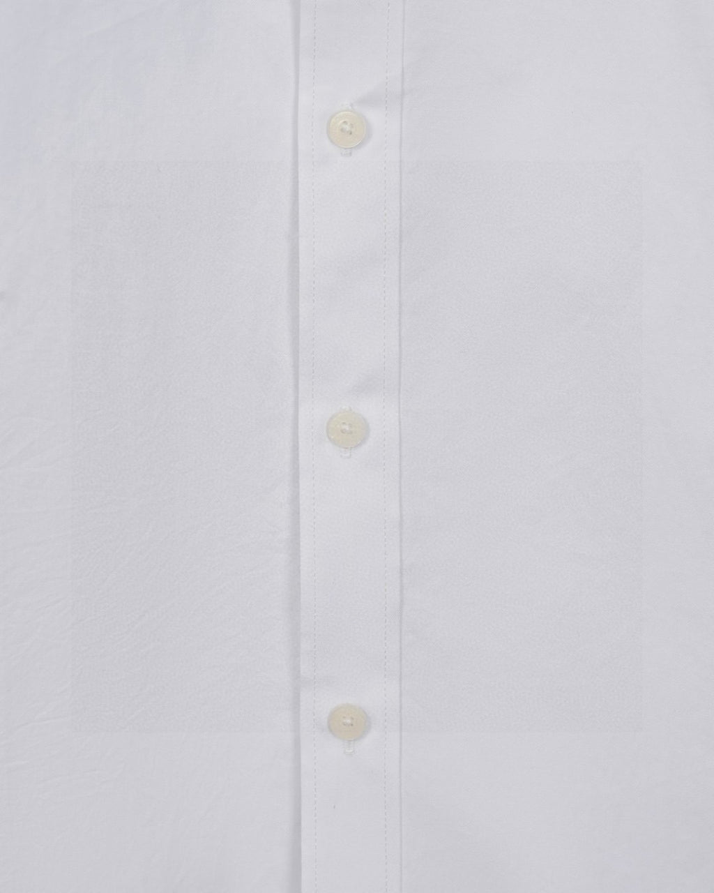 White shirt placket with three visible buttons