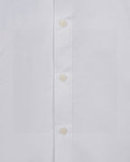 White shirt placket with three visible buttons