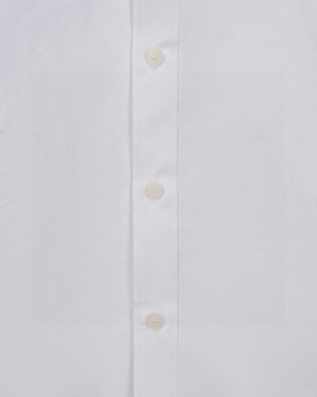 White shirt placket with small round buttons