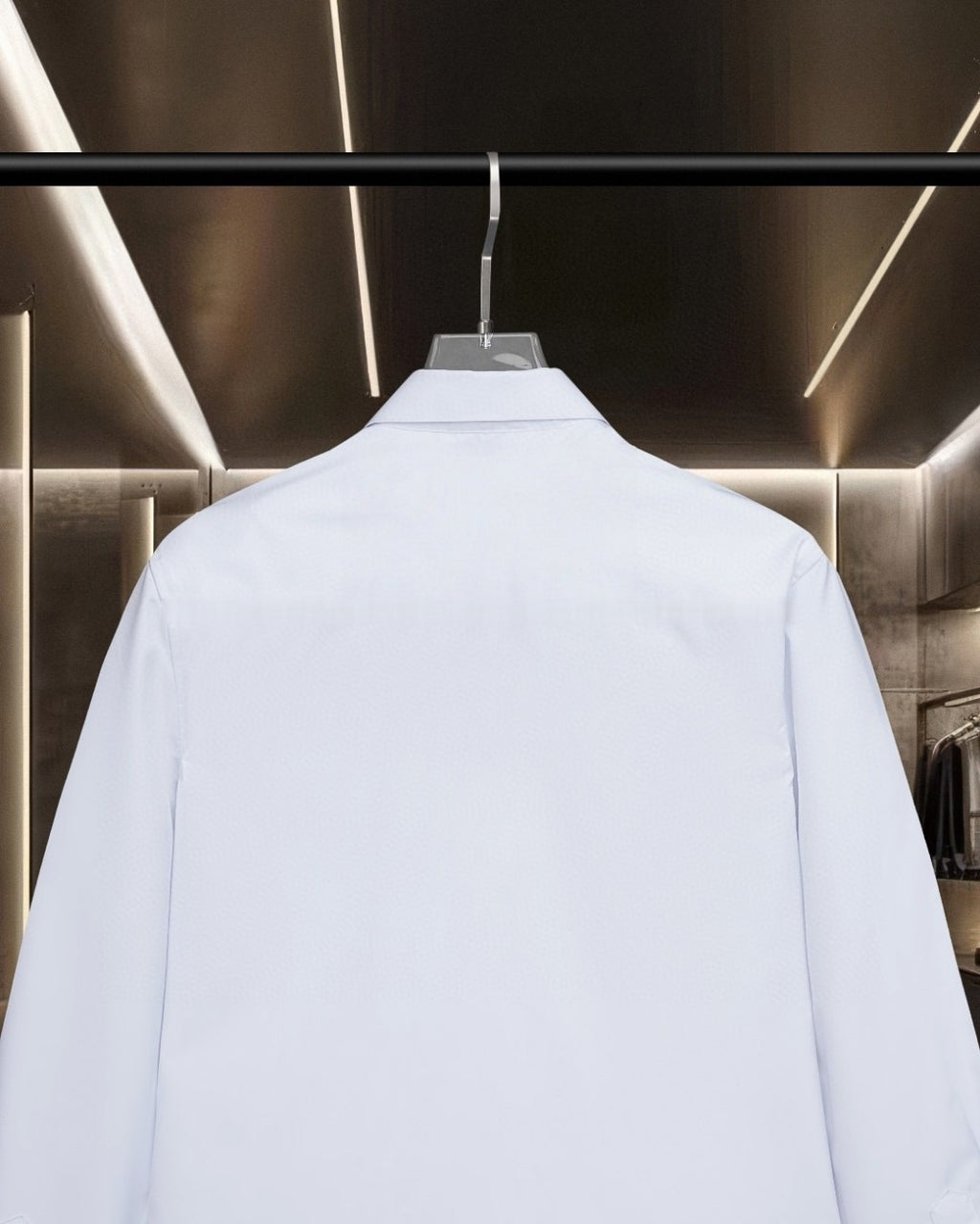 White long-sleeve button-up shirt, upper back yoke view