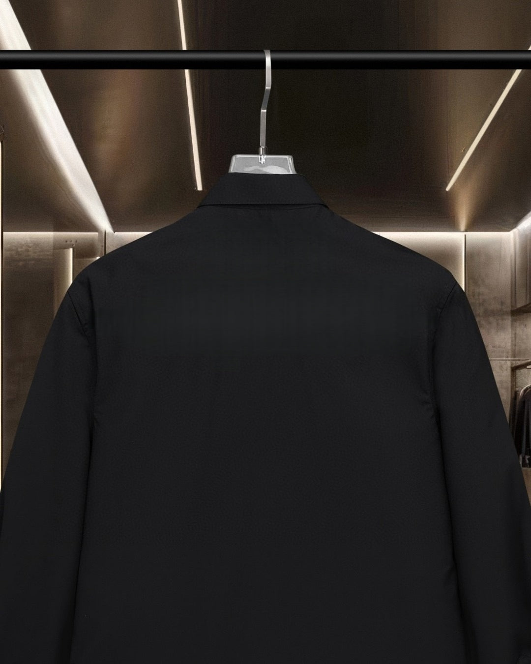 Black long-sleeve button-up shirt back view with center seam detail
