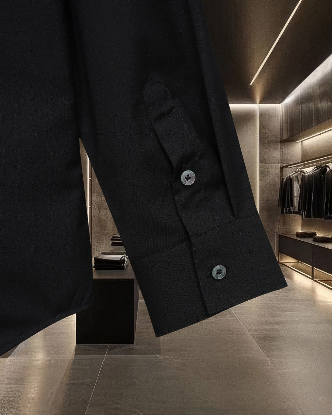 Black shirt cuff with button and folded placket detail