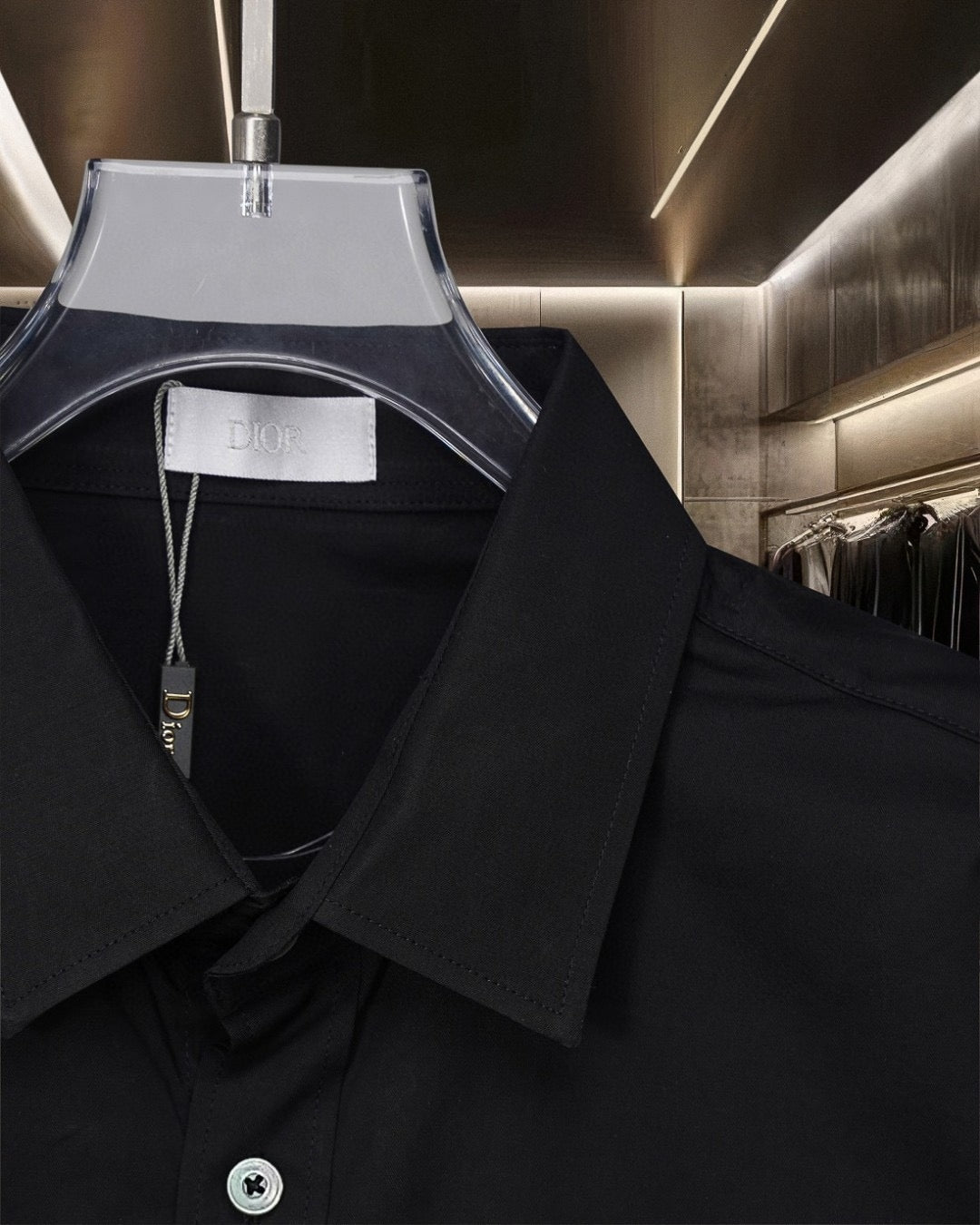 Dior black button-up shirt collar and placket close-up with inner label