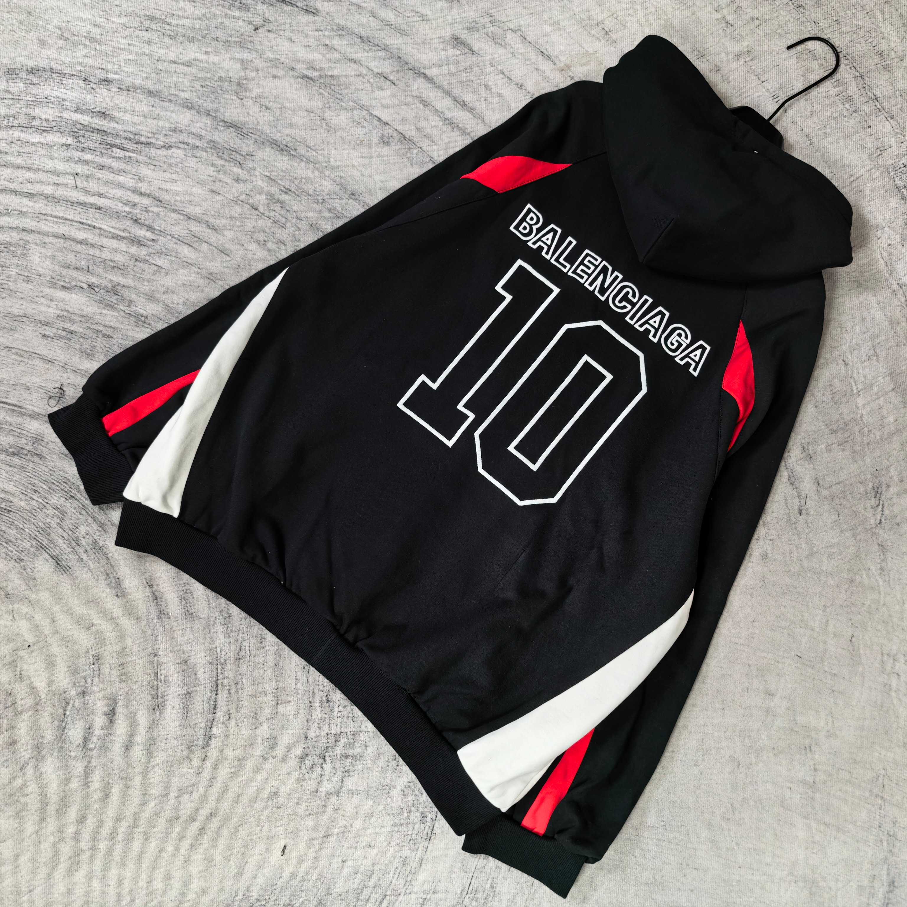 Balenciaga black zip-up hoodie with BALENCIAGA 10 back print and red side accents