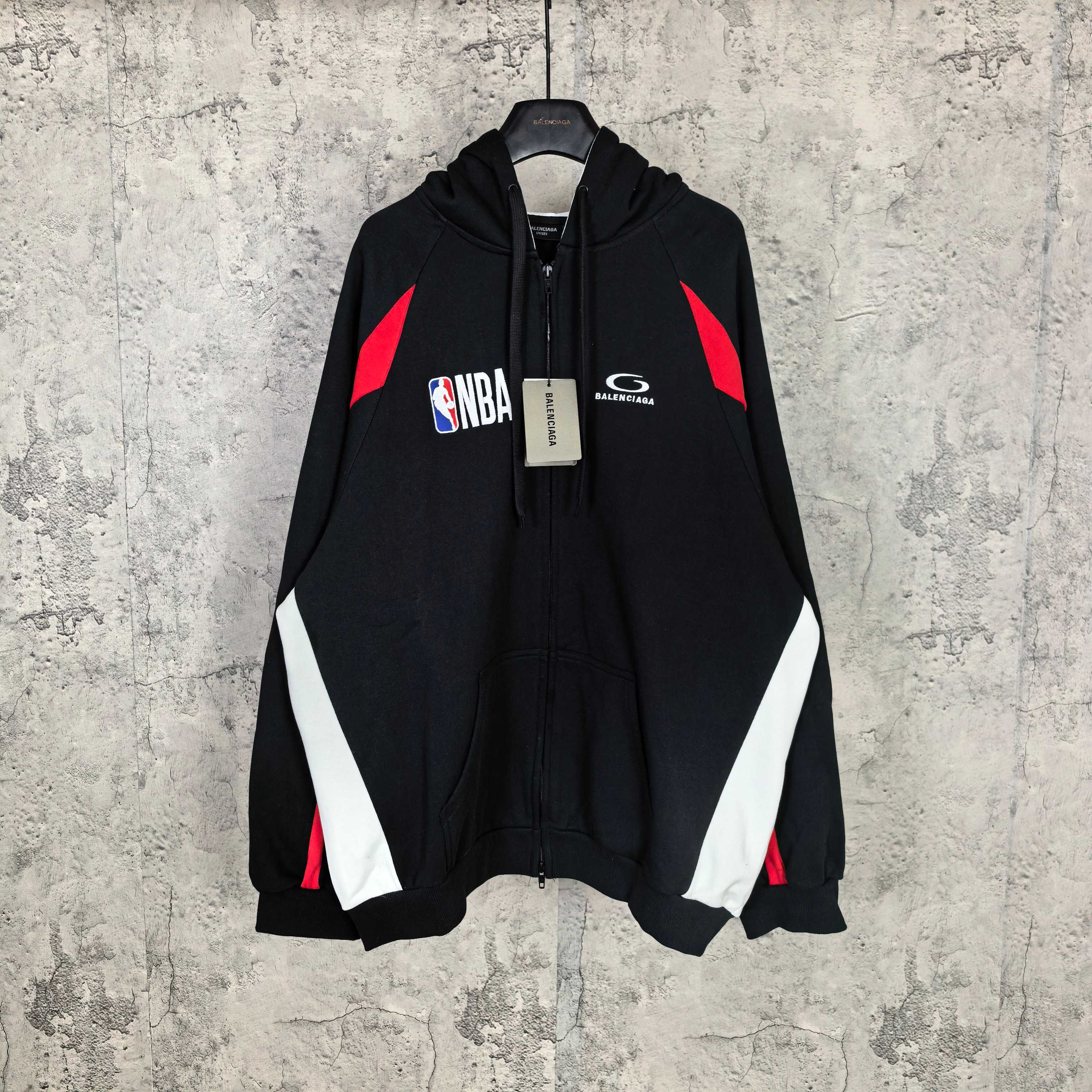 Balenciaga black zip-up hoodie with NBA logo and red/white graphic accents