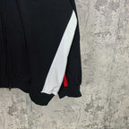 Balenciaga long hoodie sleeve, black with white diagonal panel and red accent