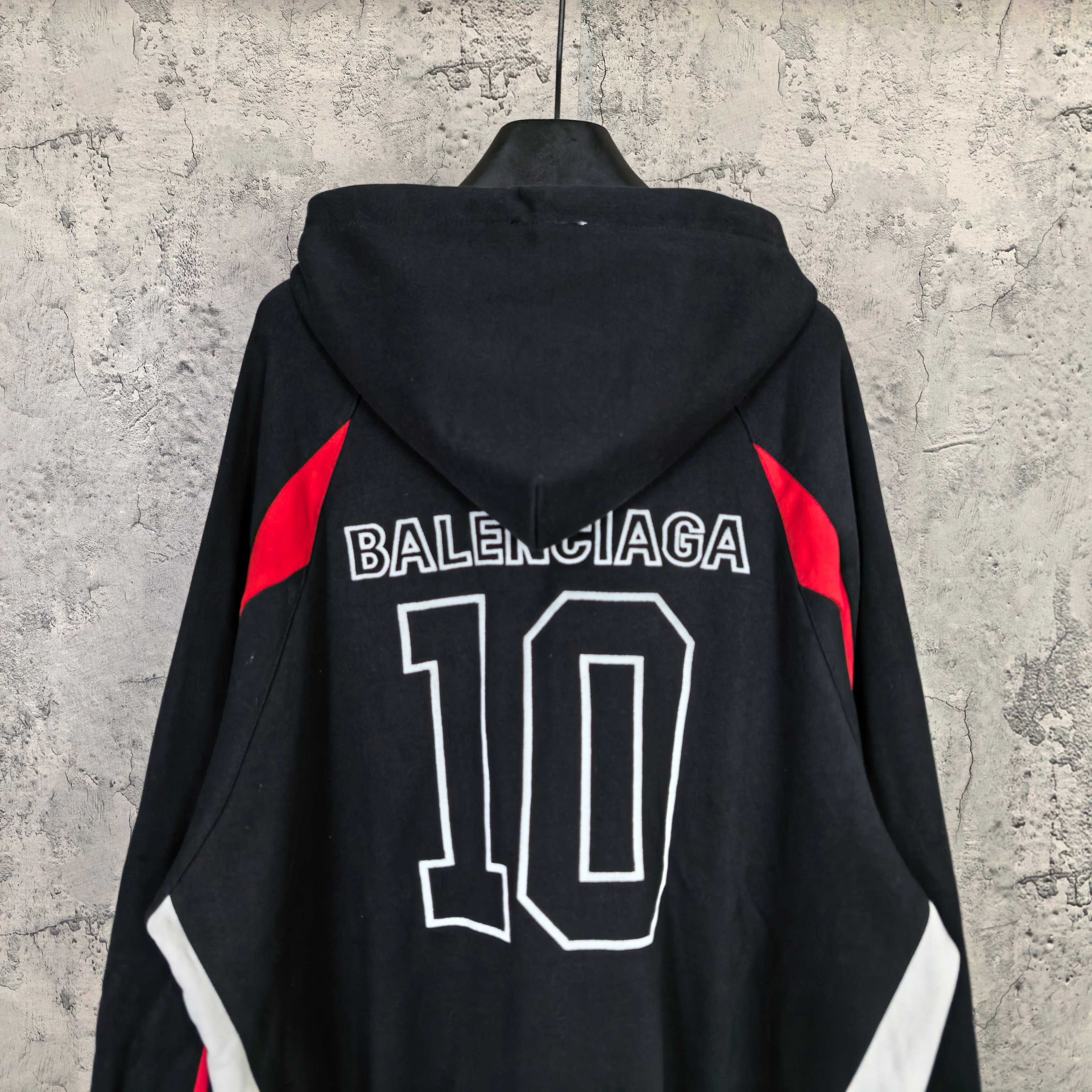 Balenciaga black zip-up hoodie with BALENCIAGA 10 large back print and red side triangles