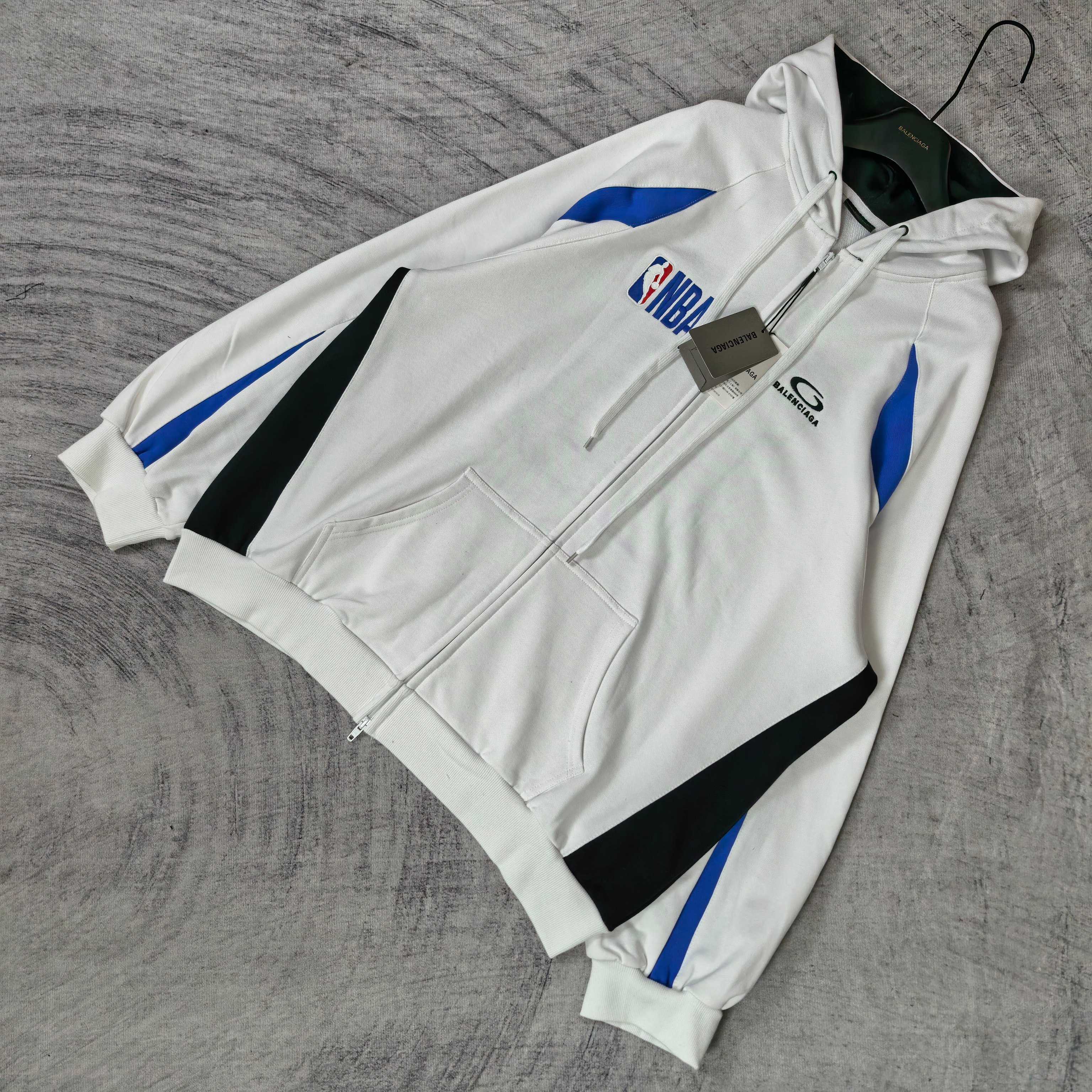 Balenciaga long zip hoodie white with diagonal black trim, NBA graphic and blue stripes