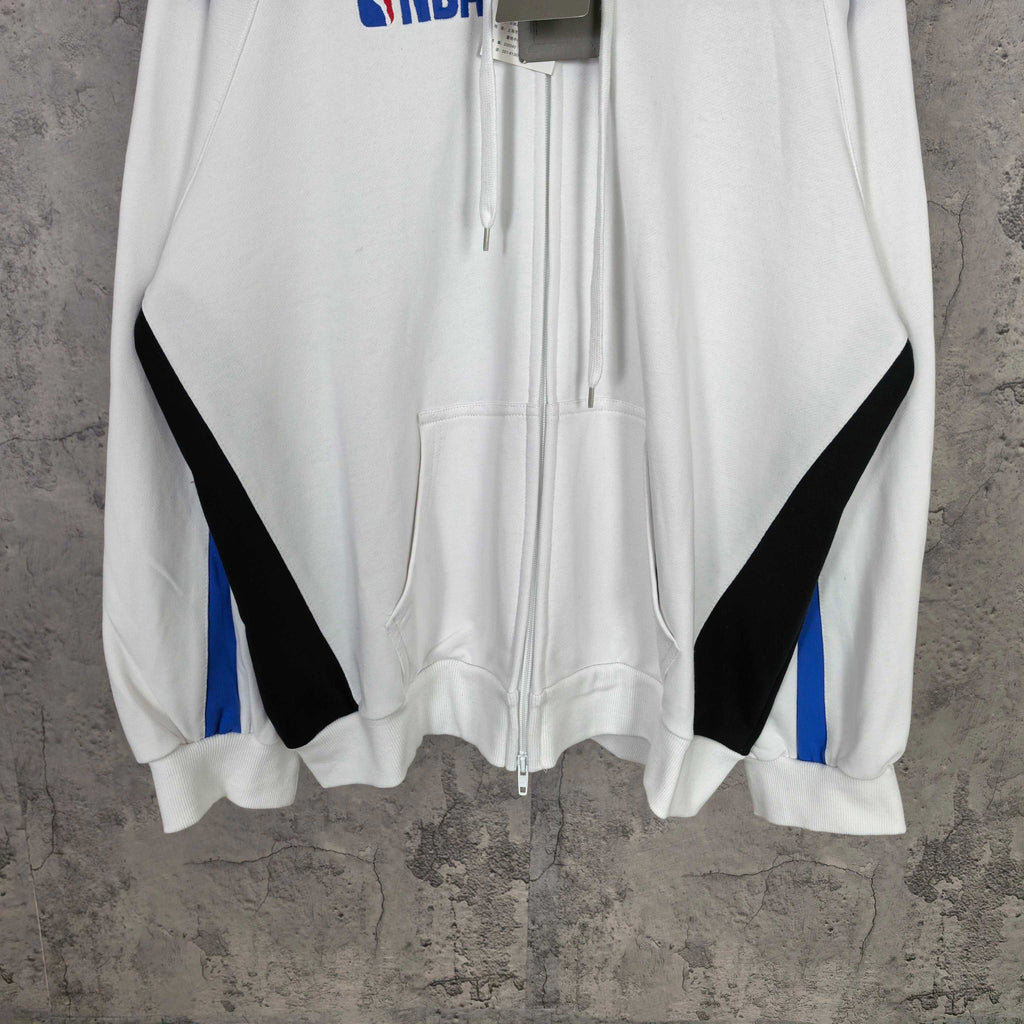 Balenciaga long zip-up hoodie front view, white with black diagonal panels