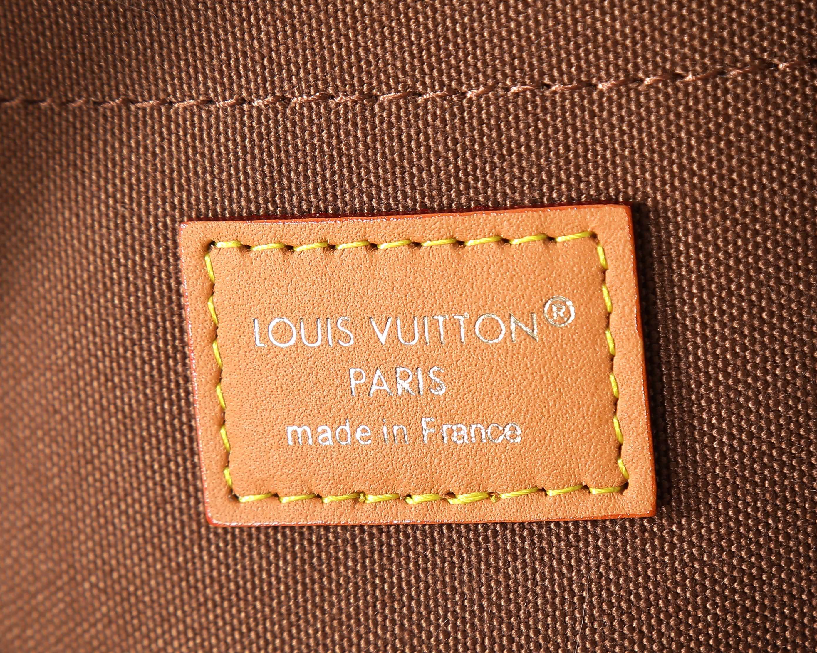 Louis Vuitton Paris made in France leather tag with yellow stitched border